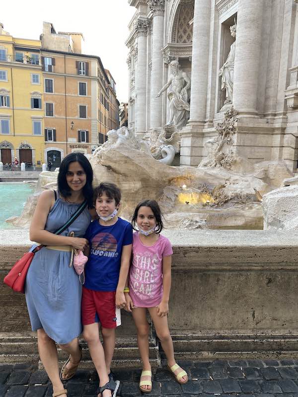my children and I dressed for Rome in summer, at the Trevi Fountain