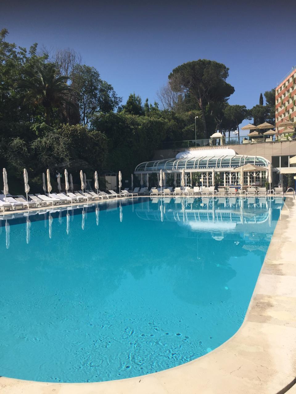 Outdoor swimming pool at Waldorf Astoria Cavalieri Hilton hotel 