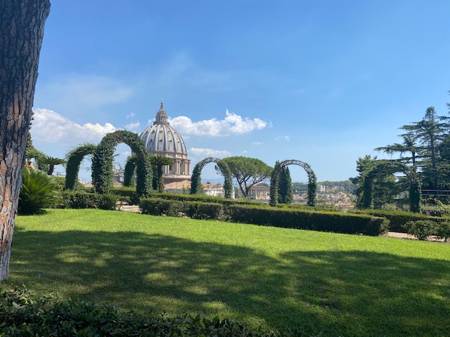 Vatican gardens with St Peter dome in background