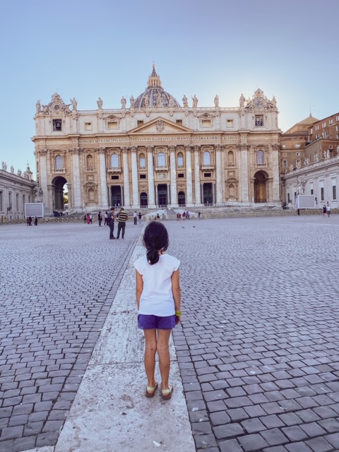 child looking at St Peter church