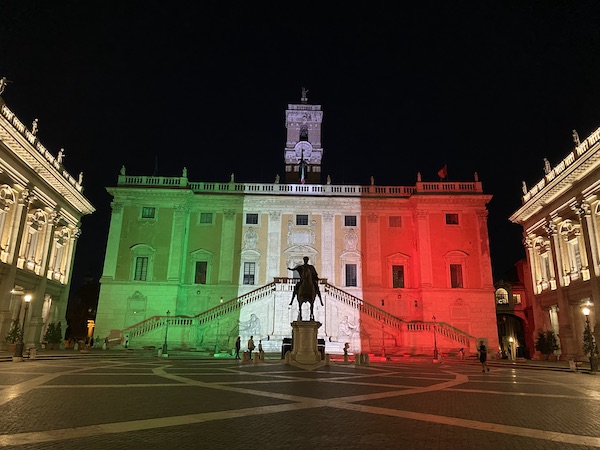 Piazza del Campidoglio  on Capitoline hill with statue of Marcus Aurelius at night, with Italia tricolor lights