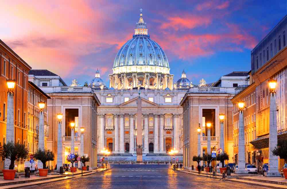 Outside of St Peter basilica in Vatican City at sunset