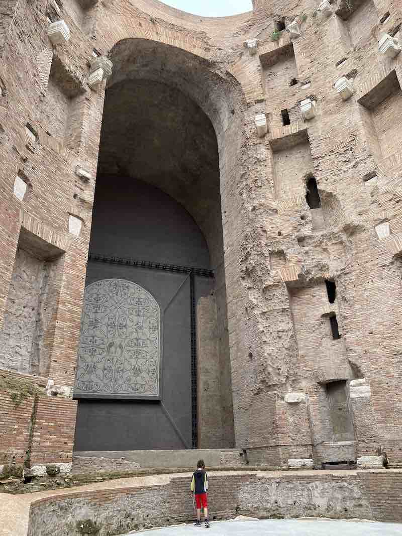 The baths of Diocletian in Rome, with a little boy to show the impressive size of this archaeological site