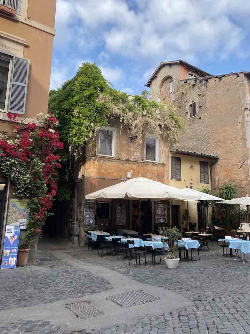 Pretty outdoor restaurant in Piazza Santa Maria della Scala in Trastevere Rome