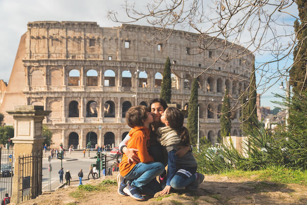 Family in front of Rome Colosseum
