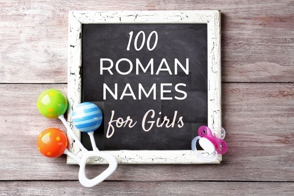 blackboard with baby toys and writing: 100 roman names for girls