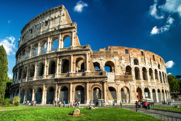 Roman colosseum onside with blue sky