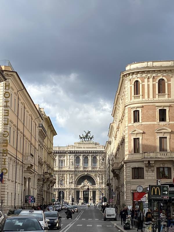 View of outside of Il Palazzaccio, Italy's Highest court, with elegant front and statue on top. Rome Prati district. 