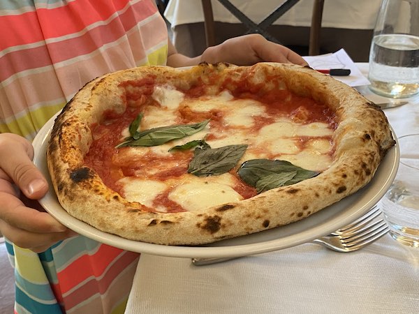 Thick crust pizza margherita in Rome