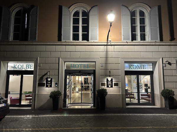 Outside of Hotel Kolbe in Rome, illuminated at night