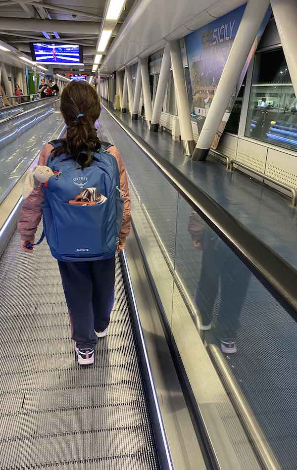 My daughter on the Fiumicino Travelator heading towards the train from Fiumicino to Rome city center